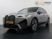 BMW iX - xDrive40 High Executive 77 kWh Trekhaak | SOH 97% | Pano | H
