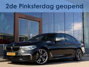 BMW 5-serie - M550i xDrive High Executive | 4WS | Soft-Close | Pano | B&W 