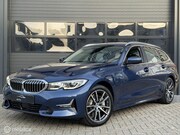 BMW 3-serie - Touring 330e xDrive | Laser | HUD | 360 | Memory
