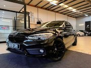 BMW 1-serie - 118i Automaat Cruise Control Stoelverwarming Parkeersensoren