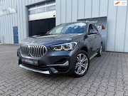 BMW X1 - XDrive20i High Executive / Airco / Navi / Cruise control / A