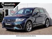 Volkswagen Tiguan - 1.4 TSI eHybrid R-Line Business+ - Leer | Schuif/-kanteldak