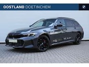 BMW 3-serie - 3 Serie Touring 330e M Sport Automaat / Trekhaak