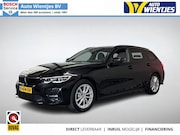 BMW 3-serie - Touring 330e | Business Edition Plus | SOH 87% | Navi | Leer