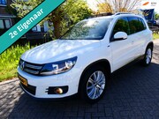 Volkswagen Tiguan - 1.4 TSI R-Line 122pk 2e eig. Clima Navi PDC Pano Xenon