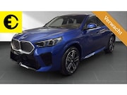 BMW iX2 - eDrive20 65 kWh | 98, 3% SOH | Alcantara stoelen | Camera