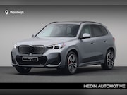 BMW iX1 - eDrive20 67 kWh M Sport Edition | Trekhaak | Frozen pure gre