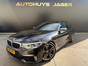 BMW 5-serie - Touring M550d xDrive Pano Hud H&K Massage Leder Carplay 360