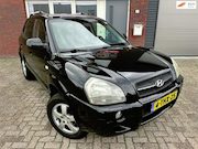 Hyundai Tucson - 2.0i Active / Leder / Stoelverw / clima / LM