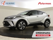 Toyota C-HR - 1.8 Hybrid Bi Tone | lage km-stand | PDC | Navigatie | BLIS