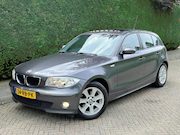 BMW 1-serie - 116i High Executive /SCHUIFDAK/CRUISE/NAVI/PDC/RIJDTSUPER/