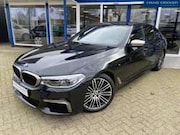 BMW 5-serie - 5 Serie M550i xDrive High Executive leer/navigatie