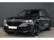 BMW X5 - XDrive50e | M-stoelen | Trekhaak | Panoramadak | Luchtvering