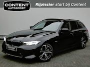 BMW 3-serie - 320e M-Sport Aut. |Schuifdak |Head-Up |Facelift - Widescreen