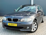 BMW 1-serie - 120i Anniversary KOOPJE AUTOMAAT 120i SCHUIFDAK RIJD SCHAKEL