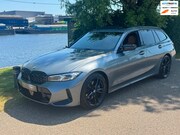 BMW 3-serie - Touring 330i xDrive M Sport Laser Panodak Memory HuD VOL