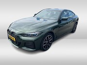 BMW i4 - eDrive40 High Executive 84 kWh / SoH 99% / Trekhaak / Schuif