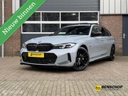 BMW 3-serie - Touring 330e xDrive M Performance Panodak HUD LED Navi Carpl