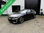 BMW 3-serie - Touring 330e High Executive