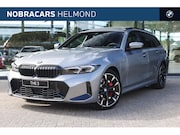 BMW 3-serie - 330e Automaat / Panoramadak / Trekhaak / Sportstoelen / Acti