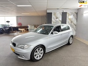 BMW 1-serie - 116i High Executive, Airco, Cruise, Parksensoren, Key&Go, N.