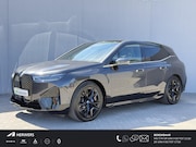 BMW iX - M60 Excellence 112 kWh / SOH 94% / 1e eigenaars auto / Schad