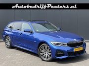 BMW 3-serie - Touring 330e xDrive M Sport 50 Jahre Pano Laserlicht HUD Cam