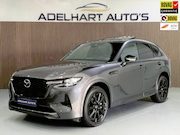 Mazda CX-60 - 2.5 e-SkyActiv PHEV Homura Plus 328 PK Nieuw / Panorama dak 
