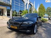 BMW 5-serie - Touring 523i High exe aut panorama/leer, na