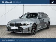 BMW 3-serie - 3 Serie Touring 330e M Sport Automaat / Trekhaak